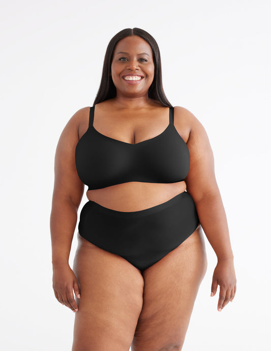 Marlene has 50" hips and wears a Knix size XXL